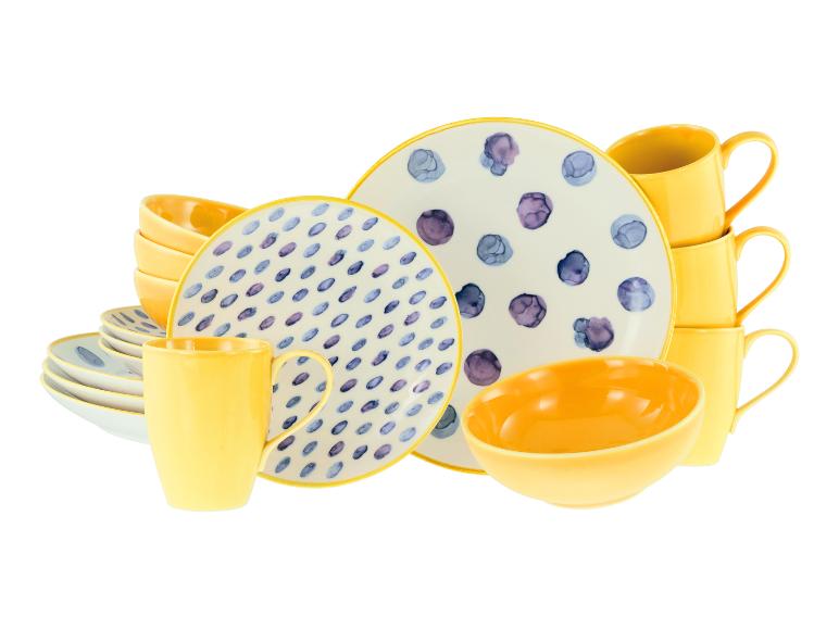 Gelb-weißes gepunktetes Geschirrset mit Tellern, Schalen und Tassen