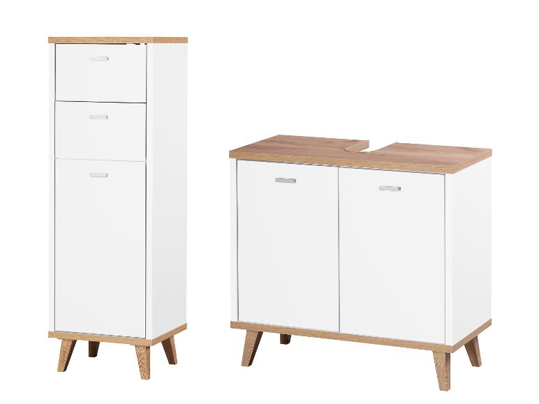 Weiße und holzfarbene Badezimmerschränke im modernen Design.