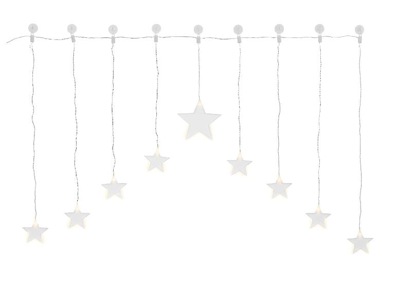 Leuchtende Girlande mit weißen Sternen, auf weißem Hintergrund hängend