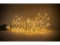 Drei leuchtende Weihnachtsgeschenke aus Draht mit warmweißen LED-Lichtern.
