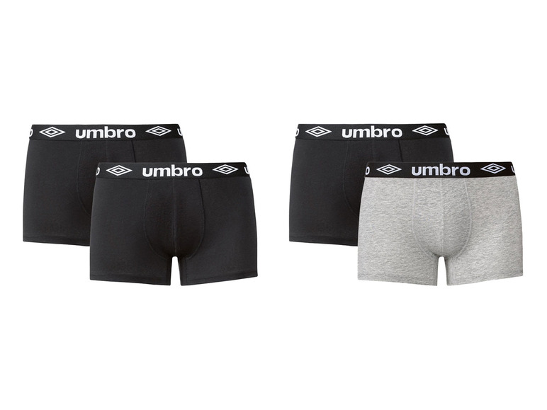 Vier Umbro Boxershorts, zwei schwarze und zwei graue.