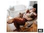 BABYGO Beistellbett Amila mit Schaukelfunktion im Zimmer mit Mutter und Baby. [KI-generiertes Bild]