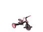 Schwarz-rosa Kinderdreirad mit drei Rädern und Pedalen.