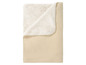 Beige Fleece-Decke mit weißem, flauschigem Futter.