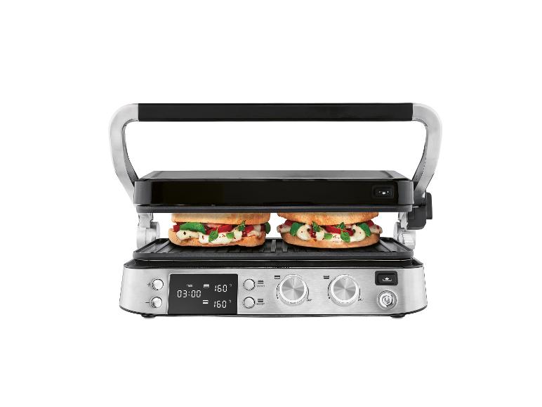 Ein Edelstahlgrill mit zwei Sandwiches, der einen Timer und Temperatureinstellungen anzeigt.