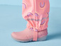 Rosa Gummistiefel mit Regenhose mit Regenbogenmuster.