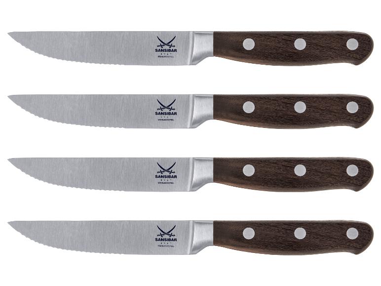 Set mit vier Sansibar Steakmessern: gewellte Klingen aus rostfreiem Stahl, dunkle Holzgriffe.