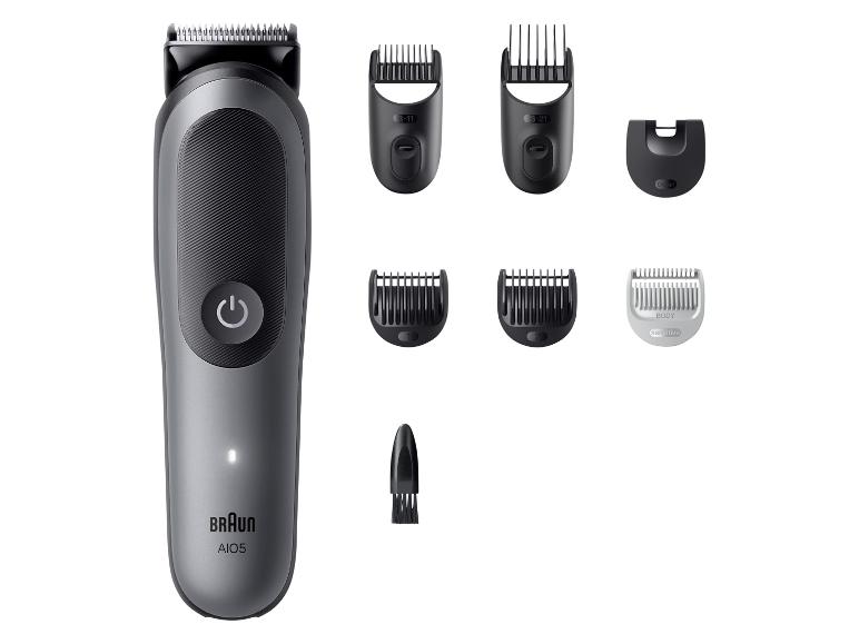 Haar- und Bartschneider mit verschiedenen Aufsätzen und Kämmen.