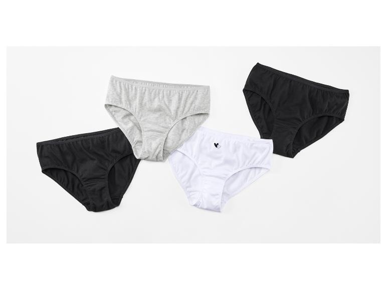 Vier Damen-Slips in Schwarz, Grau und Weiß, einer mit Herz-Emblem.