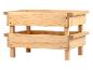 Holzaufbewahrungsbox mit vier Beinen, aus hellem Holz gefertigt.