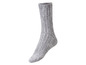Eine graue Wollsocke.