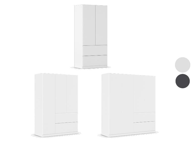 Drei weiße Kleiderschränke mit Schubladen in verschiedenen Größen