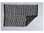 Grau-schwarze Badematte mit gewebter Textur.