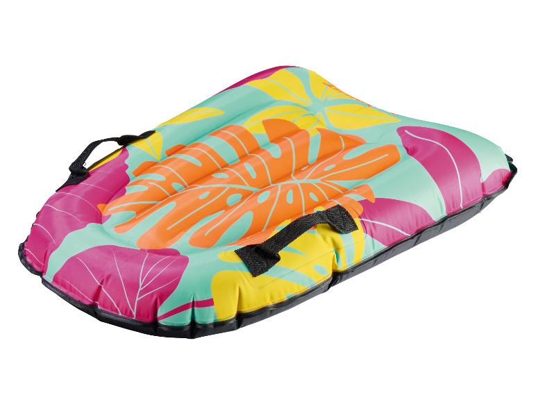 Aufblasbares Bodyboard mit tropischem Blattmuster in Pink, Orange, Gelb und Türkis, mit schwarzen Griffen.