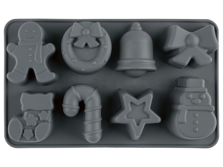 Weihnachtsformen für Kekse, darunter gingerbread man, Glocke und Stern.