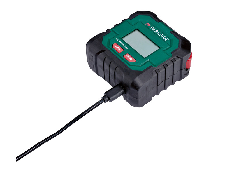 Ein grüner Parkside Laser-Entfernungsmesser mit schwarzem Kabel.