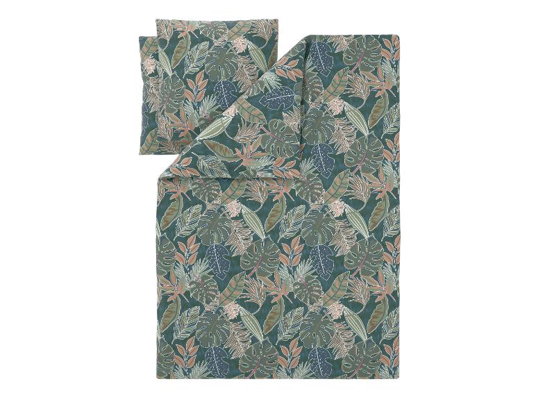 Bettwäsche-Set mit tropischem Blättermuster in Grün- und Brauntönen.