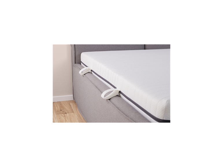 LIVARNO® Kaltschaummatratze auf einem grauen Bett.
