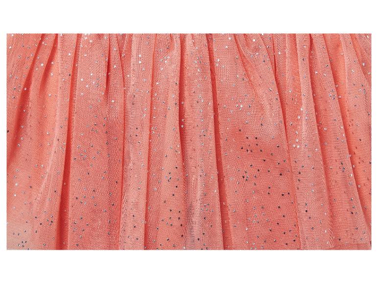 Ein rosa Tüllrock mit silbernen Pailletten.