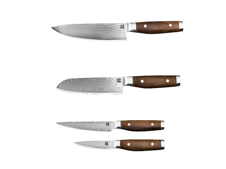Set aus vier Küchenmessern mit Holzgriffen und Damastklingen.