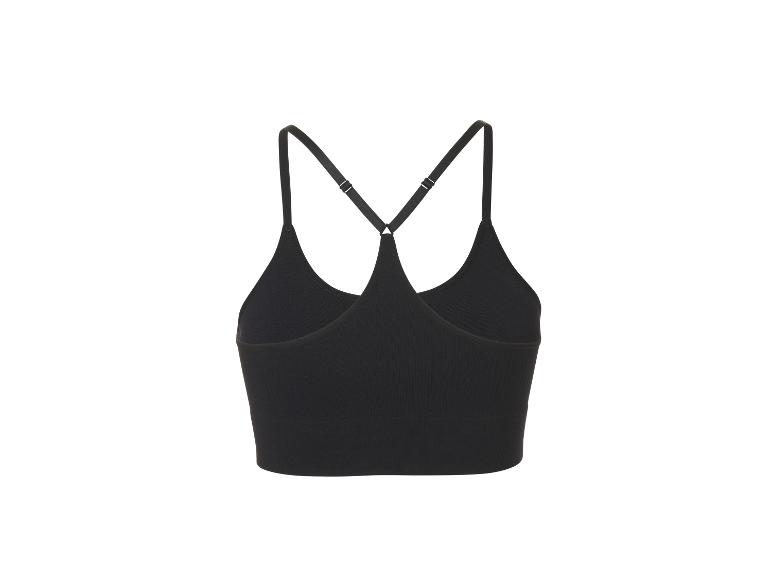 Schwarzes geripptes Sporttop mit überkreuzten Trägern am Rücken.