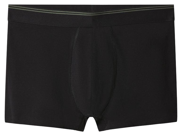 Schwarze Herren-Boxershorts mit grünen Streifen am Bund.
