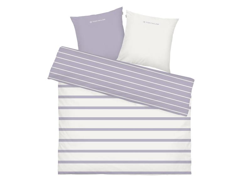 Tom Tailor Bettwäsche und Kissenbezüge mit lila und weißen Streifen.