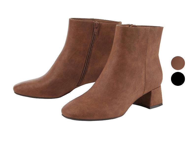 Braune Stiefeletten mit niedrigem Absatz.