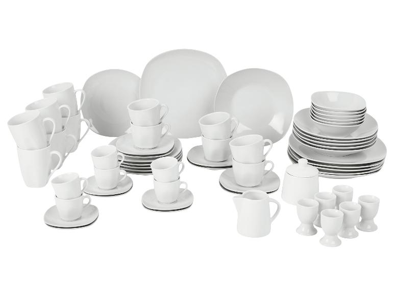 Weißes Porzellangeschirr-Set mit Tellern, Tassen, Schüsseln, Zuckerdose, Milchkännchen und Eierbechern.