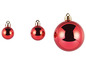 Drei rote Weihnachtskugeln in verschiedenen Größen
