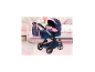 BAYER DESIGN Kombi-Puppenwagen Xeo Deluxe Set in Blau und Pink mit Sternenmuster in einem Kinderzimmer