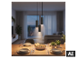 BRILONER LED-Pendelleuchte über einem gedeckten Esstisch in einem gemütlichen Wohnzimmer [KI-generiertes Bild]