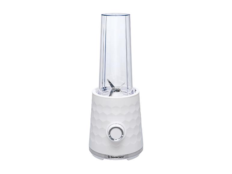 Weißer Personal Blender mit transparentem Behälter und texturierter Basis.