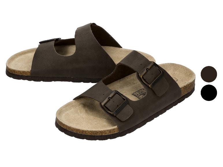 Braune Zweiriemen-Sandalen mit Schnallen und Korksohle.