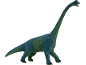 Grüner Spielzeug-Brachiosaurus-Dinosaurier auf weißem Hintergrund