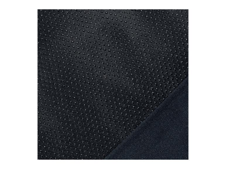 Schwarzer Antirutschstoff mit strukturierten Punkten und einem glatten Bereich.