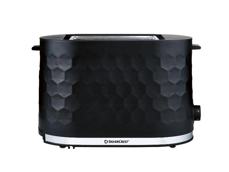 Schwarzer Toaster mit Wabenmuster und silbernem Sockel.