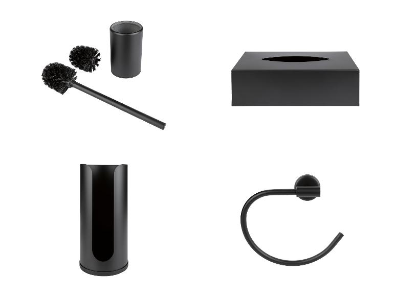Schwarzes Badezimmer-Accessoire-Set: WC-Bürste, Seifenspender, Taschentuchhalter und Handtuchhalter.