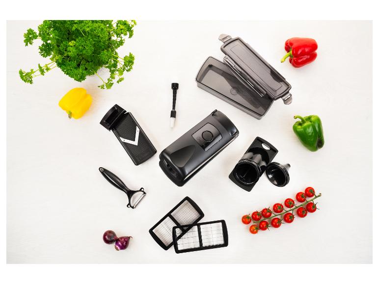 Genius Küchenzubehör-Set zum Gemüseschneiden, mit Paprika, Tomaten und Petersilie.