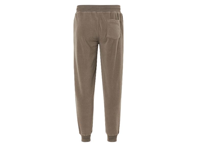 Beige Jogginghose mit elastischem Bund und Gesäßtasche.