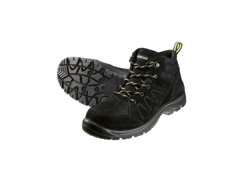 Schwarze Sicherheitsstiefel mit gelb-schwarzen Schnürsenkeln.