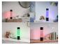 Vier Bilder einer Blasenlampe in verschiedenen Farben (rot, blau, grün, pink) in unterschiedlichen Raumumgebungen.