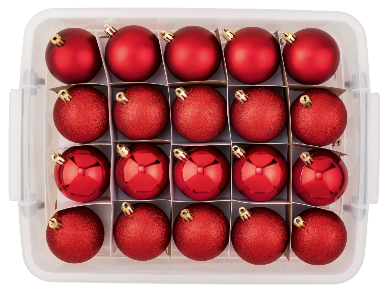 Rote Weihnachtskugeln in verschiedenen Texturen, aufbewahrt in einer transparenten Box mit Fächern.