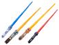 Vier Star Wars Lichtschwerter, darunter R2-D2, Chewbacca und Darth Vader.