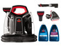 Bissell MultiClean Spot & Stain Teppichreiniger mit Zubehör und Flüssigkeiten.