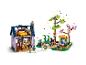 LEGO Friends Set mit Haus und Garten, drei Figuren und einem Kaninchen.