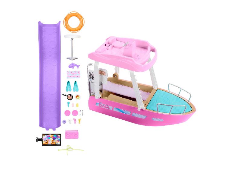 Barbie Spielset mit rosa Boot und Strandzubehör.