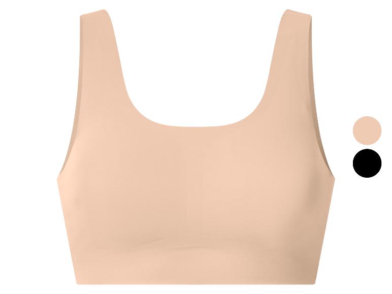 Hautfarbener nahtloser Sport-BH mit breiten Trägern, gezeigt mit schwarzen und hautfarbenen Farboptionen.