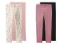 Set aus vier Kinderleggings: zwei rosa, eine mit Regenbogenmuster und eine schwarze.