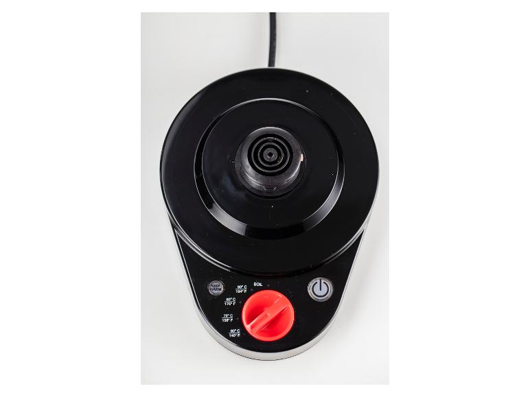 Draufsicht auf eine schwarze Wasserkocherbasis mit Temperaturreglern und einem roten Knopf.